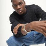 UNOde50 Гривна Gravedad